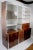 Rosewood Metal Glass and Formica Wall Unit Baugnman Attributed for John Stuart For Sale - Image 9 of 13