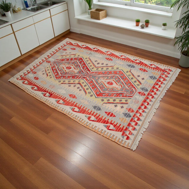 Handwoven in western Anatolia’s Oushak region during the 1970s, this vintage flat-weave kilim embodies the sophisticated...