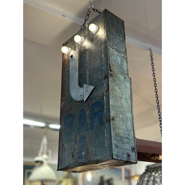 Super cool galvanized metal fragment from a retro neon sign with hand painted blue “Bar” and raised silver metal arrow....