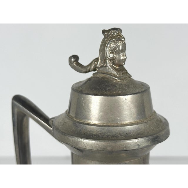 Antique Stoneware & Pewter Syrup Pitcher for your consideration. The pitcher measures approx. 9 inches tall and approx. 4...
