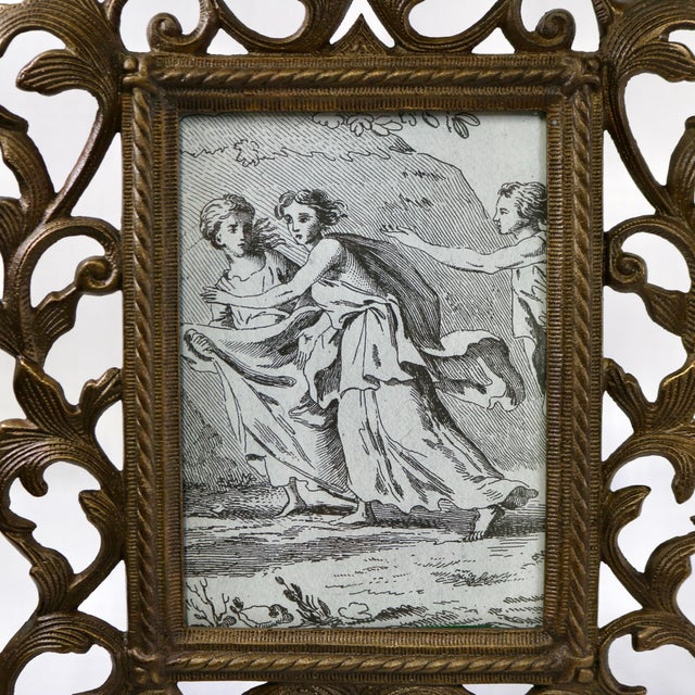 This exceptional late 19th-century Victorian-era tabletop picture frame is masterfully crafted from heavy, sand-cast solid...