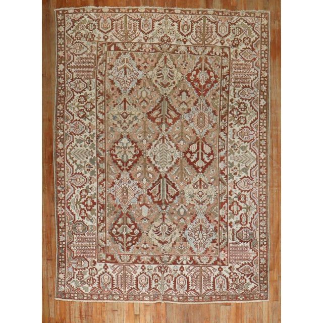 Geometric Small room-size Persian Bakhtiari rug with an all-over geometric design Measures: 7'5'' x 10'4'' circa 1940