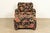 An elegant club chair or lounge chair with ottoman in paisley upholstery By Smith Brothers of Berne USA, Circa Late 20th...