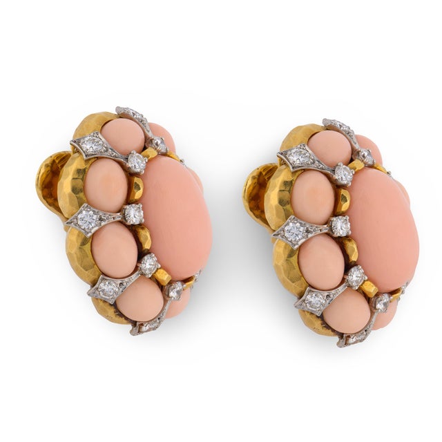 These exceptional vintage earrings by David Webb embody the bold glamour and unmistakable craftsmanship that define the...