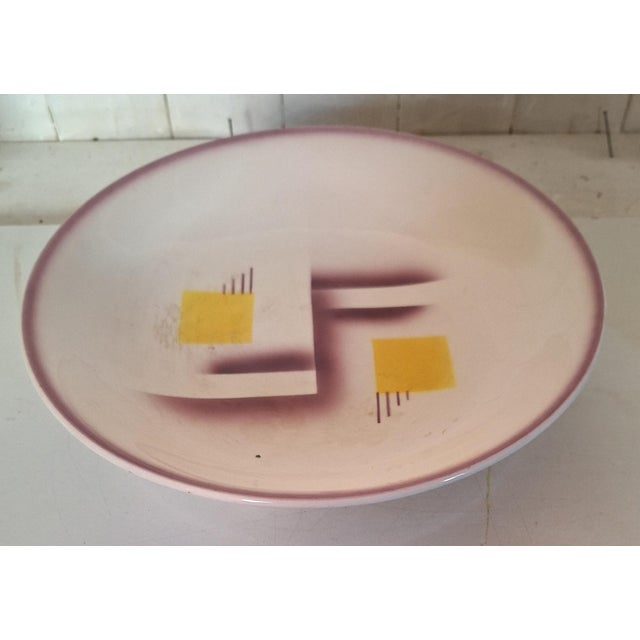 Art Deco Tripod Bowl in Cream-White Ceramic from Ama Untucht, 1920s, in Very Good conditions. Designed 1920 to 1949 This...