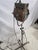 A striking mid-century industrial stage light by Ward Leonard Electric Co., mounted on an adjustable rolling stand....