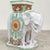 This is a mid-century Hollywood Regency terracotta white garden elephant imported and crafted in Italy for the prominent...