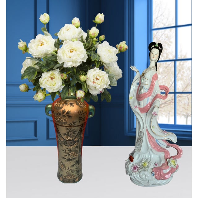 Standing 24 inches tall, the statue beautifully depicts a Chinese goddess emerging from the clouds. Her head is turned...