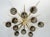 Italian midcentury flush mount with 12 large smoky Murano glass globes mounted on solid brass frame in satin brass finish...