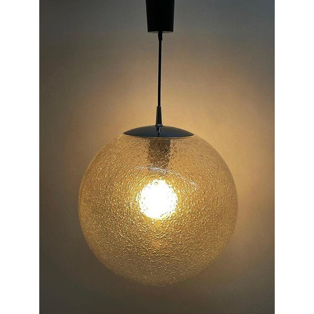 Peill & putzler 1970s large bubble ball pendant lamp a pendant lamp by peill & putzler, germany 1970s. A hand blown glass...