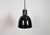 Industrial black enamel pendant light made in former Czechosloivakia during the 1950s. White enamel inside the shade....