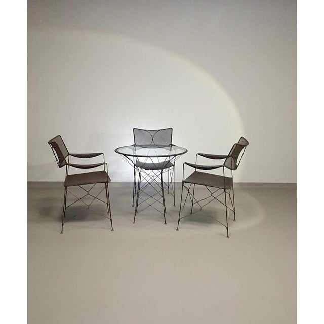 Rattan dining set Yuzuru Yamakawa Beautiful dining set designed by Yuzuru Yamakawa.The chairs and table are made of...