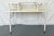 Great little mid century modern table. The table has clean lines, an upper and lower surface, and brass capped feet. The...