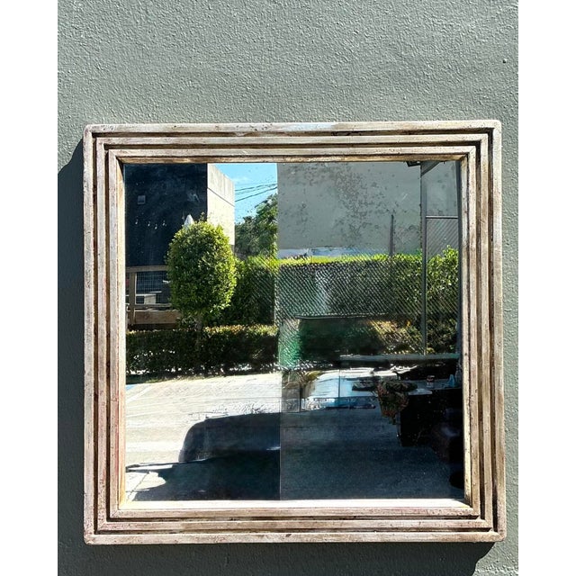This exquisite square wall mirror from Baker’s esteemed Milling Road collection perfectly balances architectural...