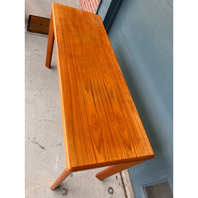 A beautifully proportioned Danish Modern console table by Vejle Stole og Møbelfabrik, the celebrated Danish furniture...