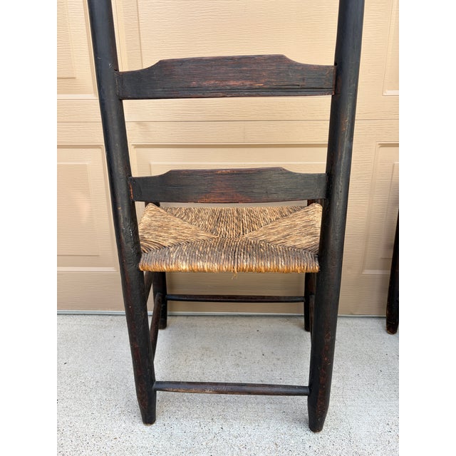 Pair of Antique Black Painted Shaker Ladder Back Chairs With Rush Seats For Sale - Image 15 of 18