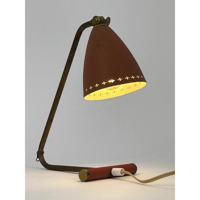 Rare and lovely mid-century modern table lamp or wall light. The lamp can be used either as table lamp or wall lamp....