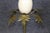 This exceptional pair of decorative candlesticks is a striking example of nature-inspired design, combining elegant brass...