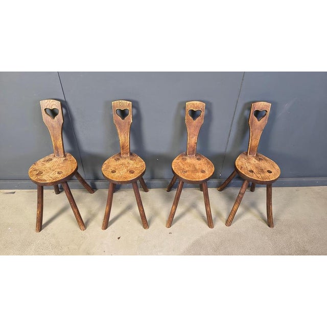 Vintage oak heart shaped dining chairs. These rustic chairs where nicely handcrafted. Sturdy frames. 1960s - France...