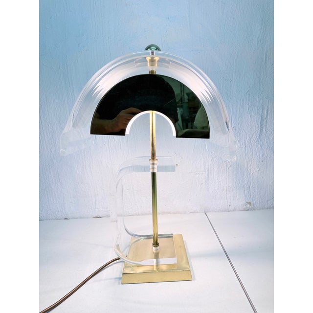 One Italian or French table lamp from the 1970s or 80s, two-bulb, E-27 socket, in the Hollywood Regency style. Acrylic...