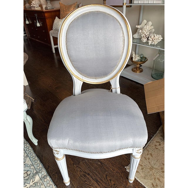 Vintage French dining chair. Fabulous condition. Original silk grey fabric with gold lead detailing. Only one left! Would...