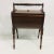 Vintage Sewing Stand With Turned Legs with rounded bottom and two doors.
