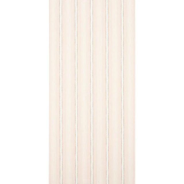 A narrow, gradient stripe with stippled accents, pink-colored Moncorvo wallpaper has a beautiful hand-drawn look....