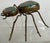 Just in time for Halloween, this whimsical eight legged friend is made of copper and stone. Antennae on the head and legs...
