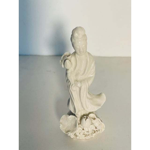 Antique Chinese Blanc de Chine porcelain figurine of Quan Yin with lotus flowers. Quality delicate collectible porcelain...