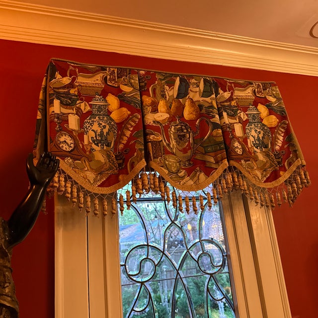 Custom drapery balance with burgundy, red ground featuring blue and white Chinese porcelain, chinoiserie, lemons, candles,...