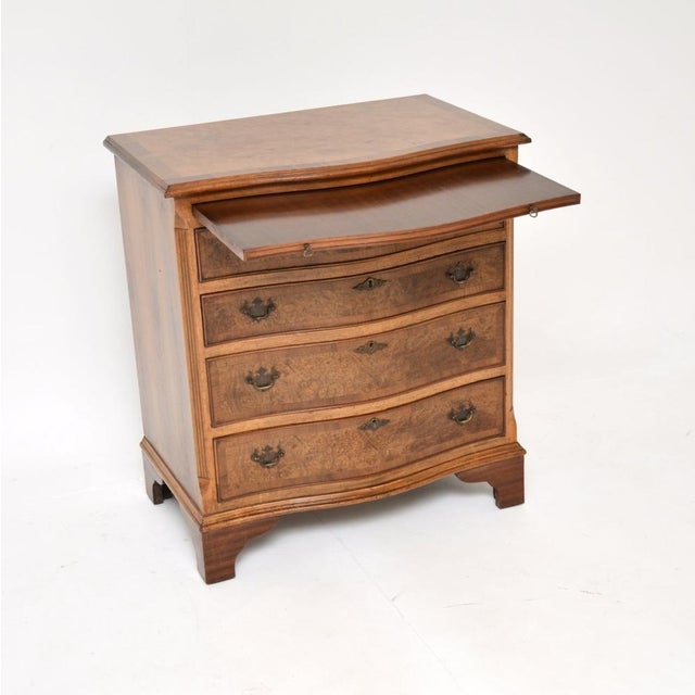 A fantastic antique Georgian style burr walnut chest of drawers. This was made in England, it dates from around the...