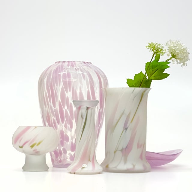 Assorted pink and white vessels, group of 5. A delicate matte and gloss group of pink, white, and clear glass vessels of...