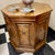 Elegant and richly detailed, this vintage Heirloom by Weiman octagonal accent cabinet showcases the timeless appeal of...