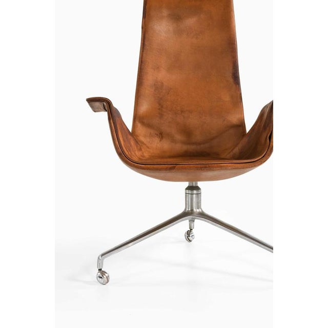 This armchair or office chair, designed by preben fabricius and jørgen kastholm and produced by alfred kill international...