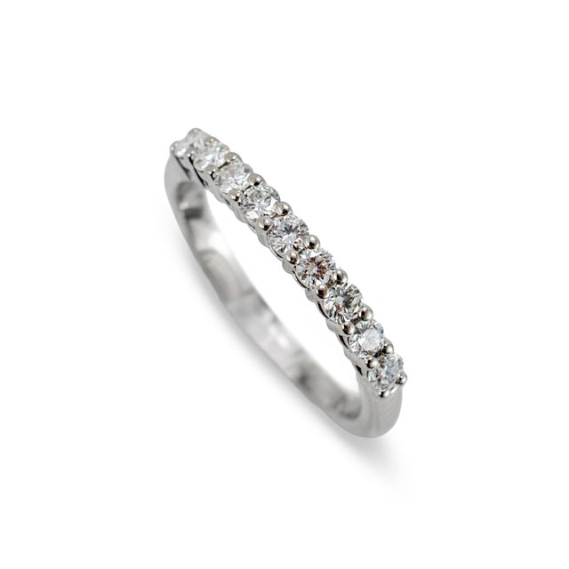 Brand: Tiffany & Co. Gender: Ladies Metal Type: 950 Platinum Ring Size: 4.5 Width: 2.20 mm Weight: 2.95 grams TIFFANY &...
