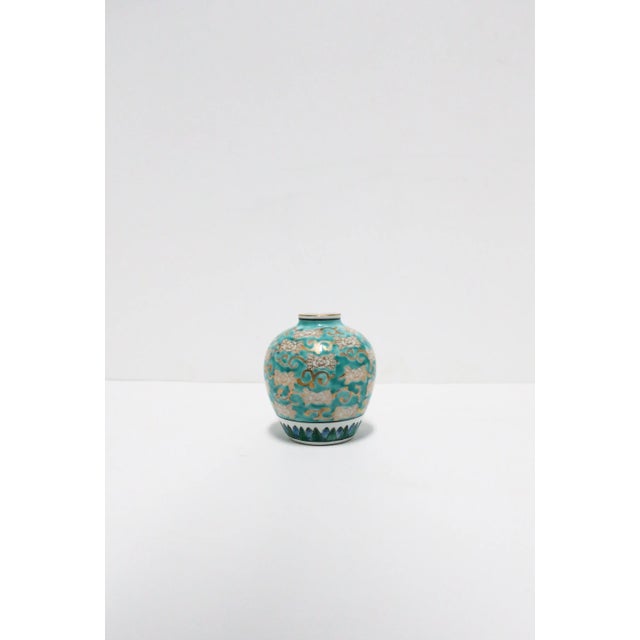 A beautiful Imari white porcelain and turquoise blue and gold urn ginger jar vase or vessel, circa 1960s, Japan. Japan is...