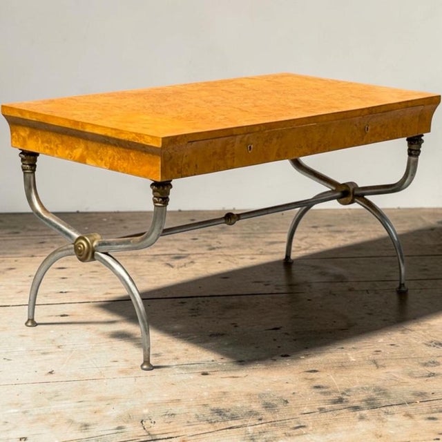 This is a 1970s Italian Maison Jansen neo-classical style desk commissioned by Bloomingdale’s. It has a bookmatched veneer...