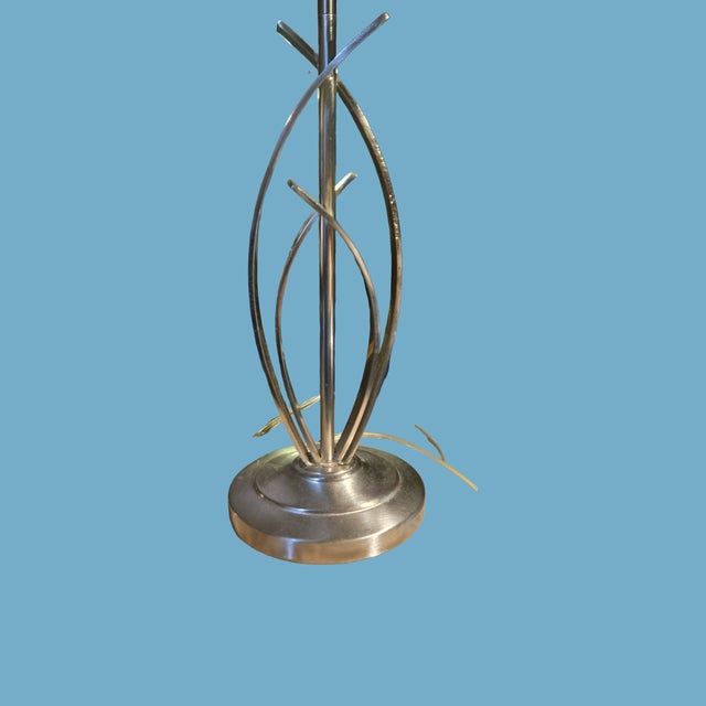 These contemporary table lamps were designed and manufactured in the early 21st century, featuring an abstract sculptural...