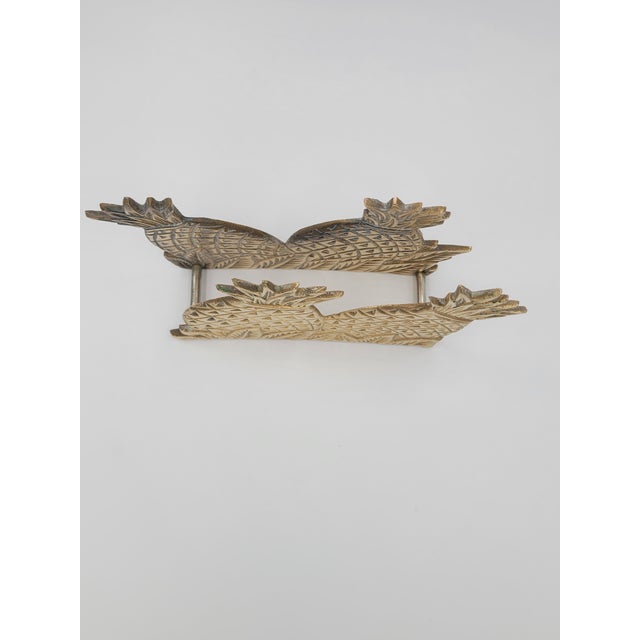 Add a touch of warmth and classic hospitality to your table or countertop with this charming brass napkin holder. The...