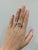This exquisite ring showcases a stunning 1.82-carat oval-shaped aquamarine, measuring 10x8mm, known for its serene, ocean-...