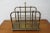 This gorgeous Magazine Rack is made out of metal, and brass. This Newspaper Stand has a highly charming Victorian...