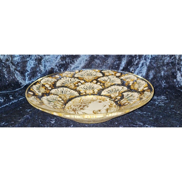 Vintage Glass Annual Plate by Björn Wiinblad, 1976, in Very Good conditions. Designed 1970 to 1979 This piece has an...