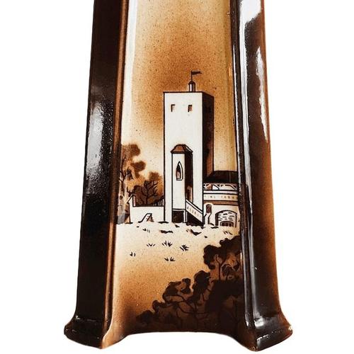 Art Deco ceramic vase with a hand-painted image of a building in Utrecht. This vase was most likely produced by the...