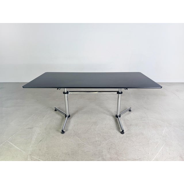 The desks have been professionally cleaned, and the tabletops have been repainted in black, true to the original. The...