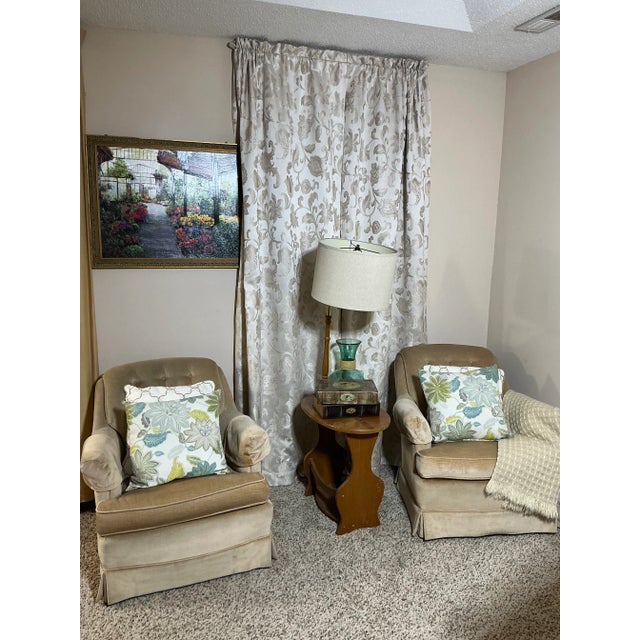 A sophisticated pair of vintage Hammary lounge chairs in rich camel beige velvet, perfect for creating a serene and...