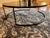 Great condition black/dark gray contemporary round glass coffee table. Glass is sealed in, not removable. Purchased...