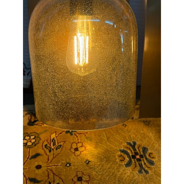 Design Plus Gallery presents a Pair of Wall Sconces with Broad Brass Back Plates and Mercury Glass Shades. These dreamy...