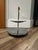 This item is a vintage two-tier tidbit or serving tray, by mid-century modern design brand Kromex, featuring two round...