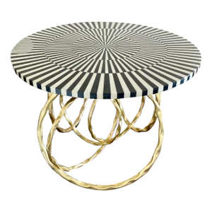 Black and White Stripe Round Top on Large Gold Overlapping Loops Knots Infinite Pattern Layered Circles Round Roxy Dining Table by Made Goods