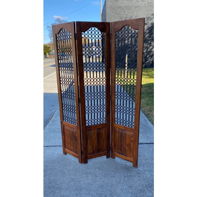 Wonderful Room Divider Screen in a Great Wood and Wrought Iron with Three Panels in very Clean Detailed Look . The Triple...